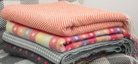 A stack of folded scarves