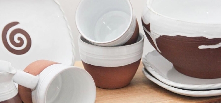 An assortment of pottery cups, plates and bowls