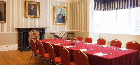 A conference table set up for ten attendees