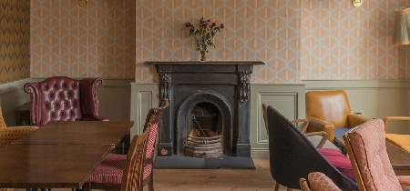 A fireplace in a lounge